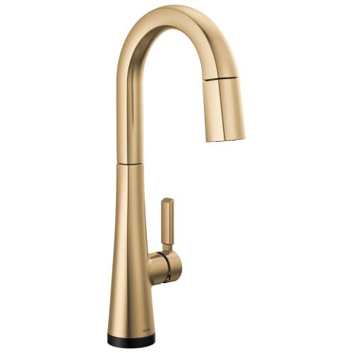 Champagne bronze single-handle pull-down kitchen faucet with curved spout and touch-activated base.