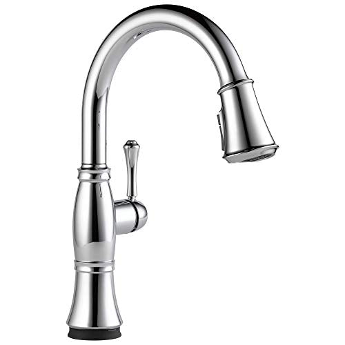 Chrome pull-down kitchen faucet with curved spout and single lever handle.