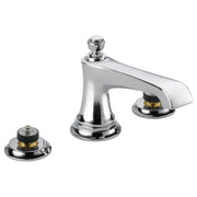 Chrome widespread lavatory faucet with tapered spout and two round base valve bodies with gold accents.