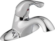 Chrome bathroom faucet with single lever handle and curved spout on white base.