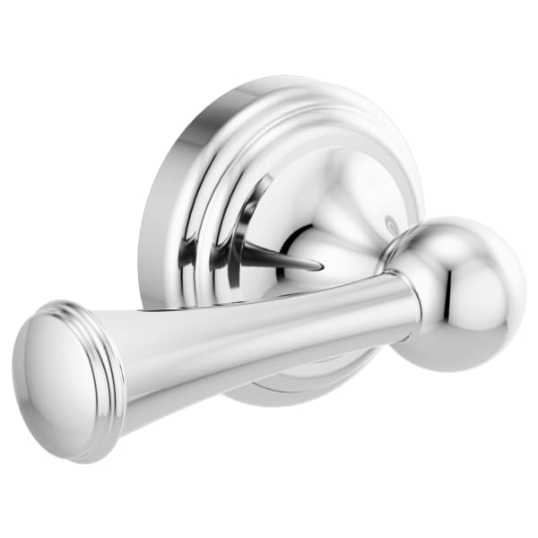 Chrome toilet flush lever with cylindrical handle and circular mounting plate against white background.