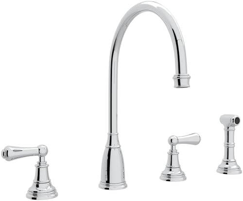 Polished chrome two-handle kitchen faucet with tall curved spout, lever handles, and separate side spray.