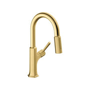 Brushed gold kitchen faucet with high curved spout and pull-down spray head with single lever handle.