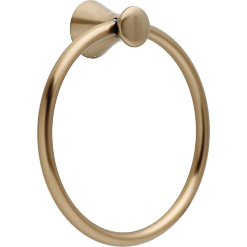 Champagne bronze towel ring with circular mounting plate and oval hanging loop.