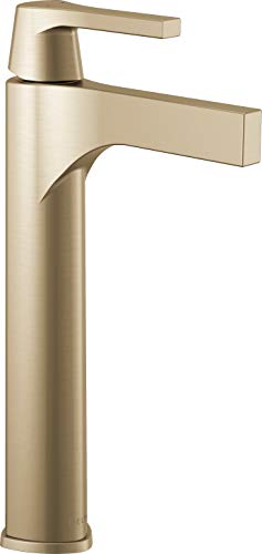 Champagne bronze single-handle vessel faucet with tall cylindrical body and angular spout.