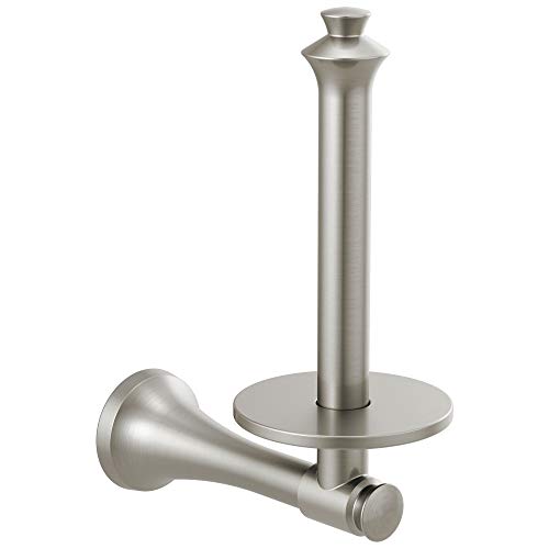 Brushed nickel vertical tissue holder with tall cylindrical post and round base, featuring roll holder arm on side.
