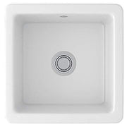 White square fireclay sink with single bowl and chrome drain fixture.