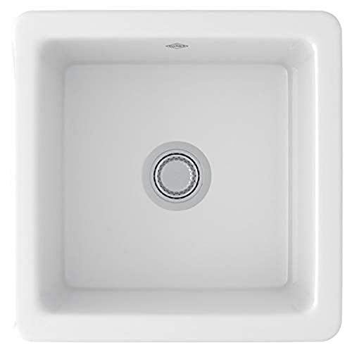 White square fireclay sink with single bowl and chrome drain fixture.