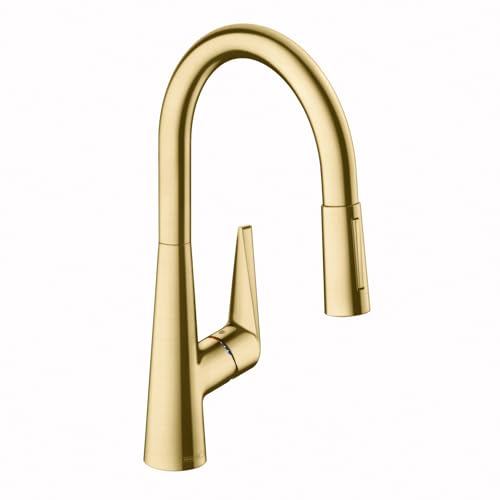 Brushed gold kitchen faucet with high arc spout and pull-down spray head.
