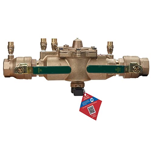 Brass backflow preventer with 1-1/2 inch threaded connections, dual lever handles, and test cocks on central body.