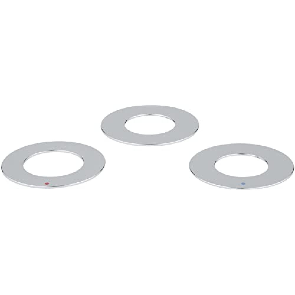 Three chrome-plated circular sealing washers with central holes, two marked with colored dots.