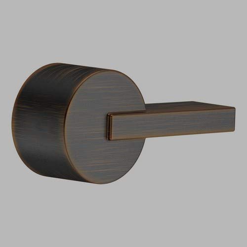 Venetian bronze metal lever handle with circular rosette and brushed finish texture.