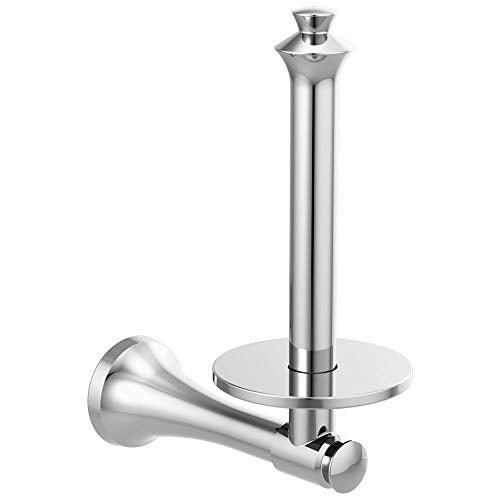 Polished chrome vertical tissue holder with round base and decorative finial top, shown with matching wall-mounted roll holde