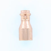Copper press reducer fitting with 2" and 3/4" connection ports on white background.