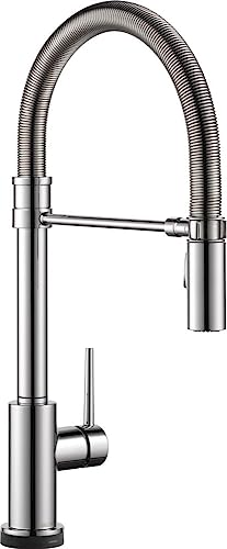 Chrome single-handle kitchen faucet with pull-down sprayer and flexible hose.