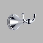 Chrome double robe hook with circular mounting plate and two curved arms with rounded ends.