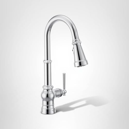 Chrome single-handle high arc pulldown kitchen faucet with spray head and lever control.