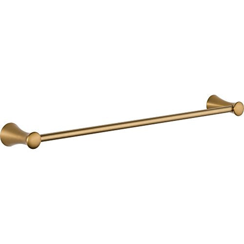 Brass towel bar with cone-shaped mounting flanges and cylindrical end caps on white background.