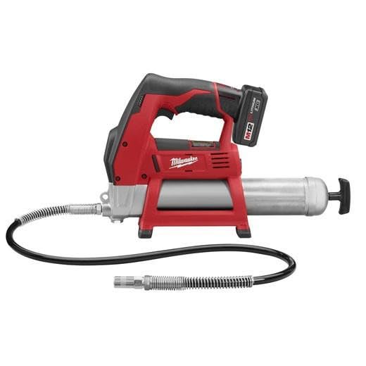 Red and black cordless grease gun with battery, hose, and coupler attachment.
