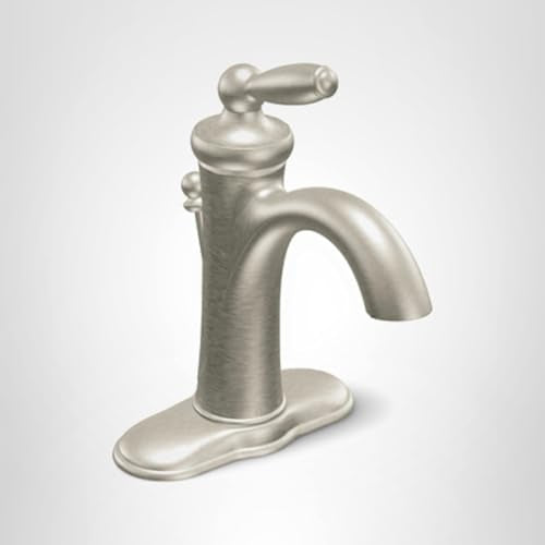 Brushed nickel single-handle bathroom faucet with low arc spout and traditional design.