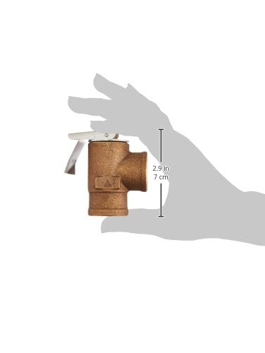 Bronze boiler relief valve with 3/4 inch female connection and pressure gauge port, shown in hand for scale.