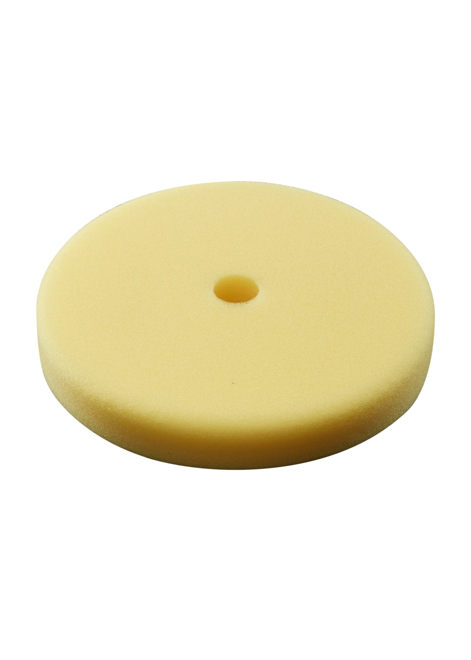 Round yellow foam polishing pad with center hole, 7 inches in diameter.