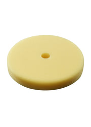 Round yellow foam polishing pad with center hole, 7 inches in diameter.