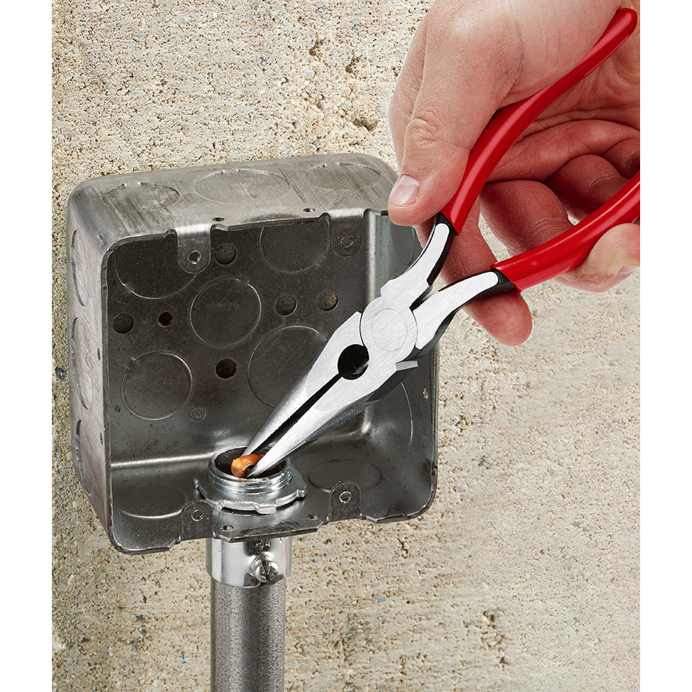 Long nose pliers with red handles and white/black grip being held over an electrical box.