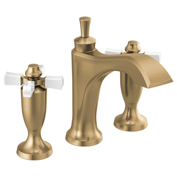 Brass two-handle widespread bathroom faucet with cross handles, curved spout, and matching pop-up drain assembly.