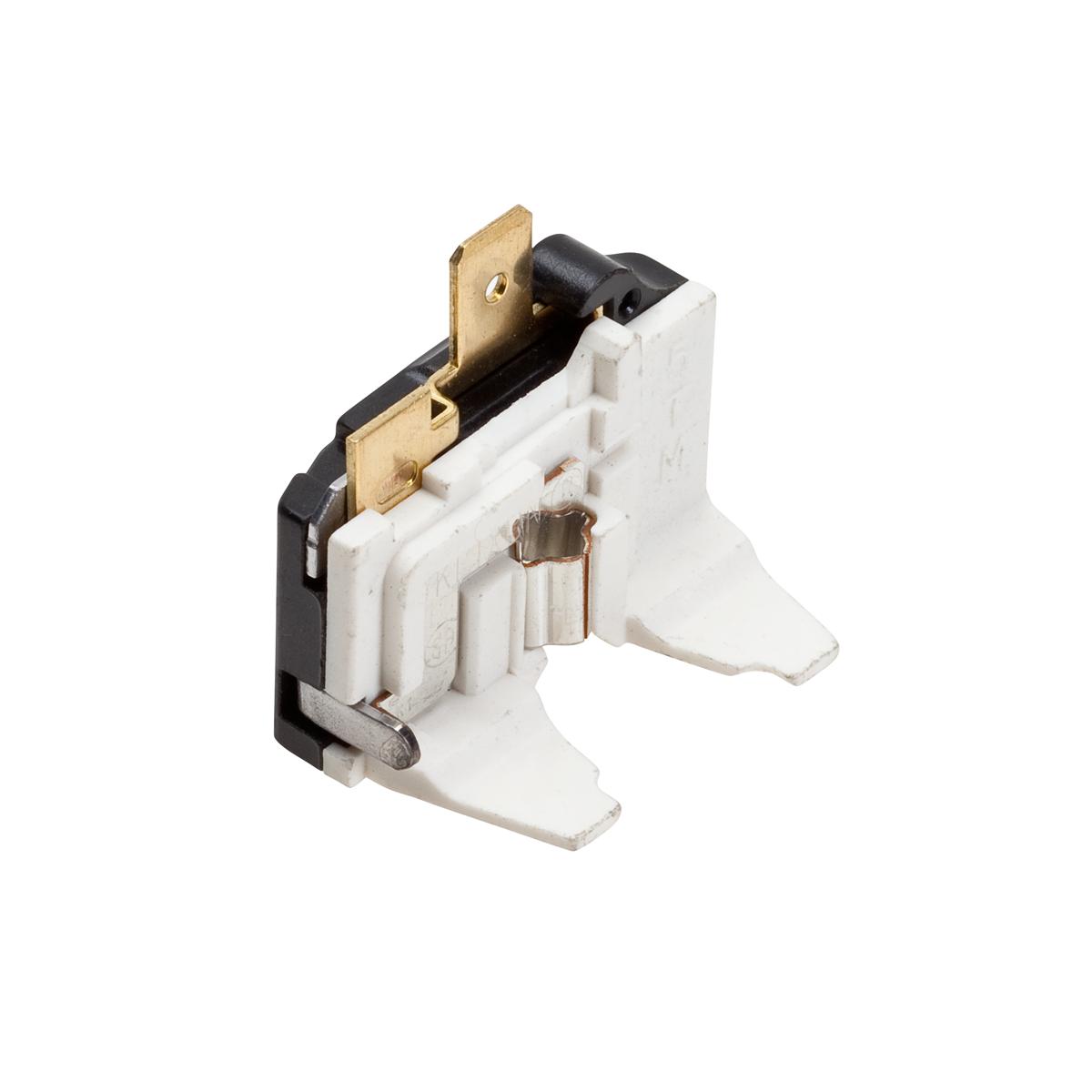 White plastic electrical switch with brass contact terminals and black solenoid coil assembly mounted on top.