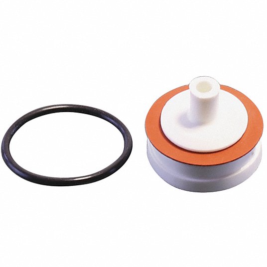 Black rubber ring and white and orange vacuum breaker repair kit components on white background.