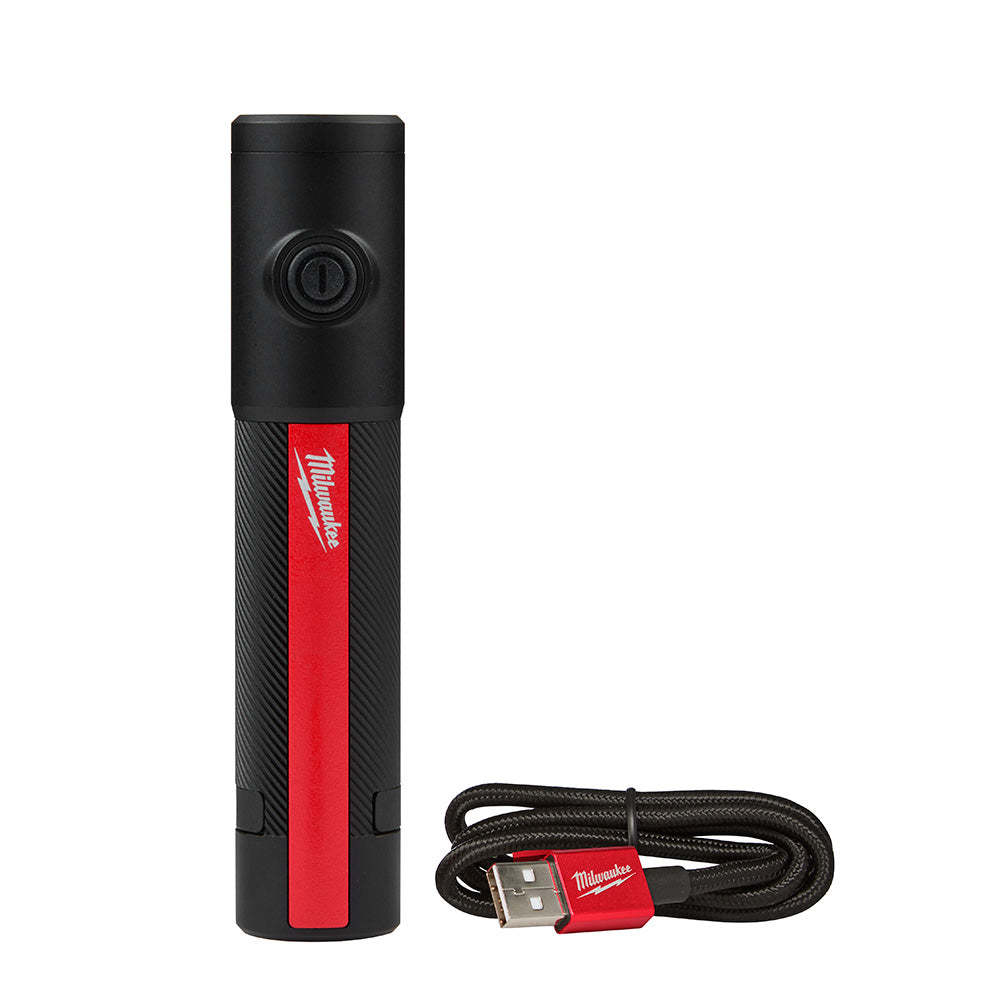 Black and red Milwaukee rechargeable flashlight with circular button on top, shown with attached USB charging cable.