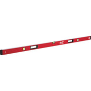 Red Milwaukee box level with multiple spirit vials and black end cap, viewed at an angle.