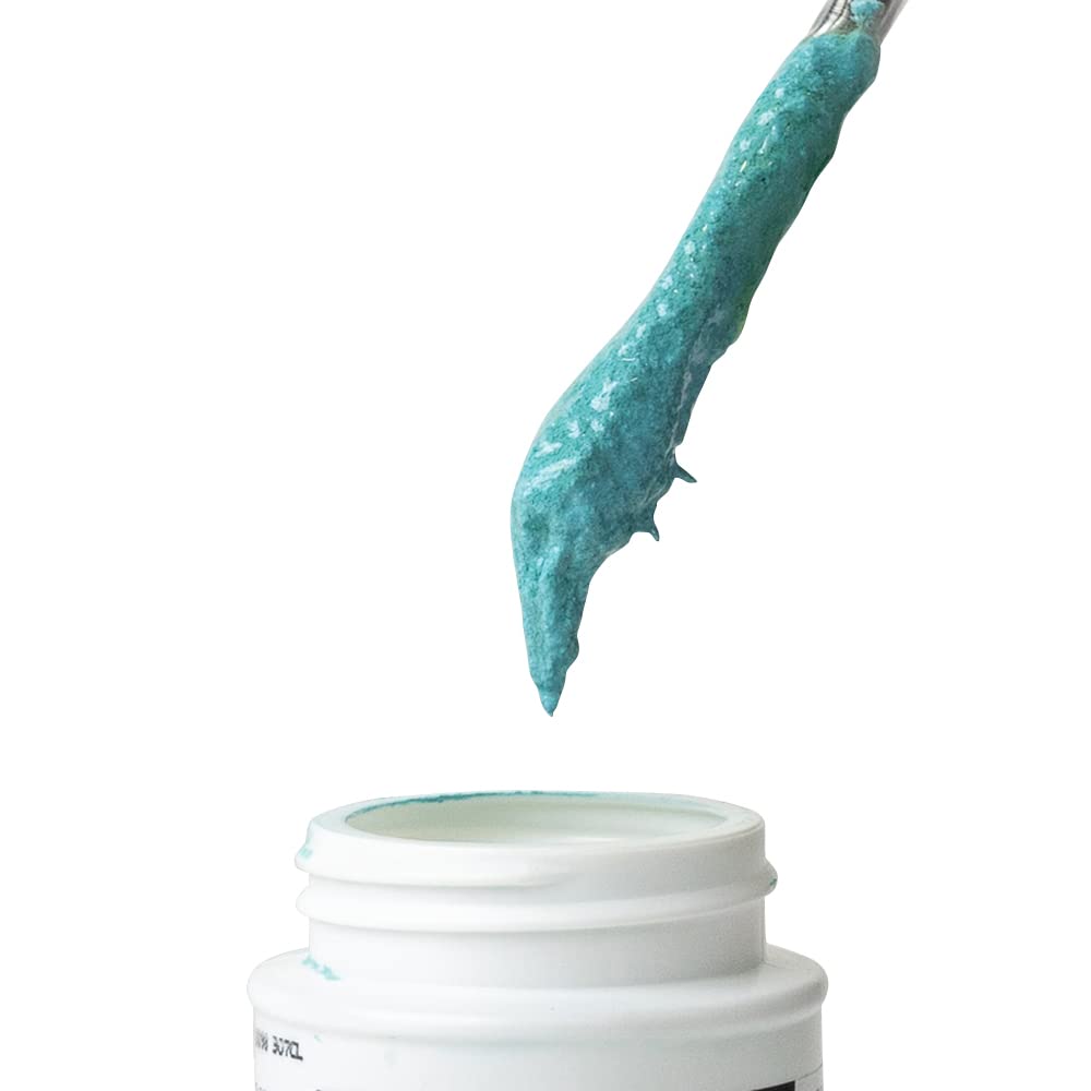 Blue pipe joint compound being applied from tube to white container.
