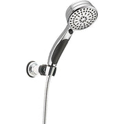 Chrome and black hand shower with circular spray head and flexible hose attached to wall mount bracket.