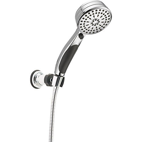 Chrome and black hand shower with circular spray head and flexible hose attached to wall mount bracket.
