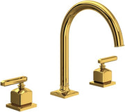 Unlacquered brass three-piece lavatory faucet with curved C-spout and lever handles on square bases.
