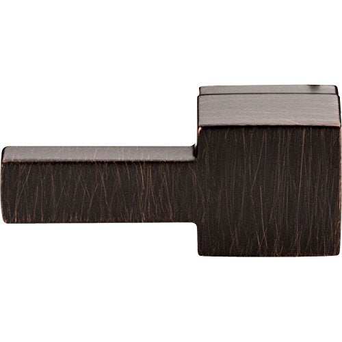 Chrome and dark bronze tank lever with textured grip surface and angular design.
