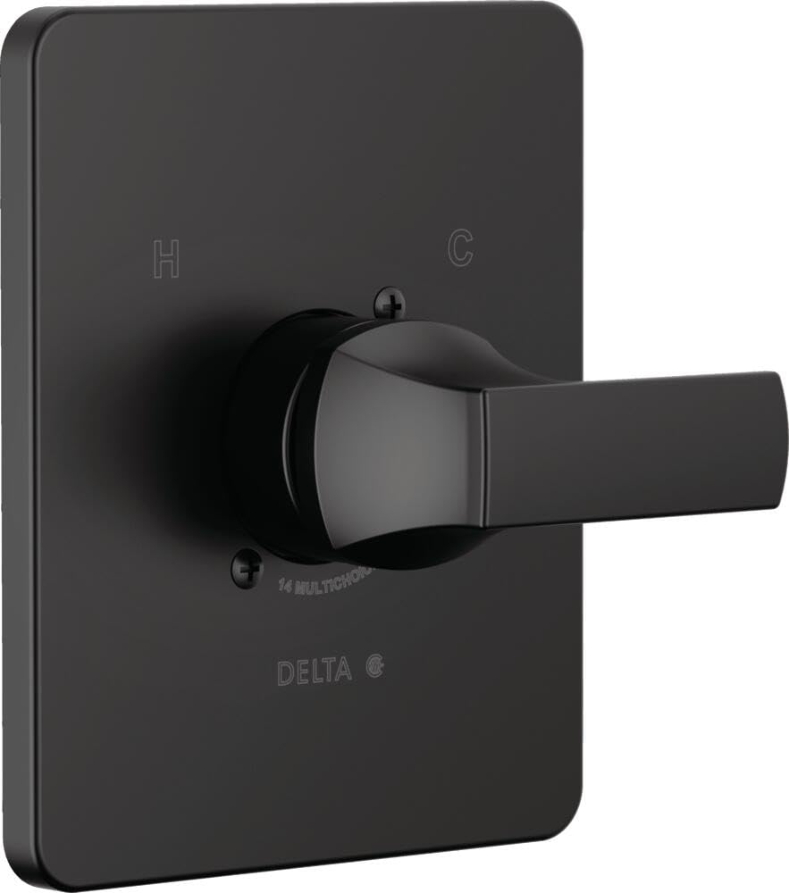 Matte black Delta shower valve trim with lever handle and rectangular escutcheon plate marked with H and C indicators.