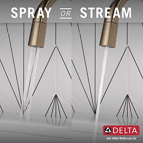Chrome pull-down kitchen faucet with dual spray and stream modes demonstrated on sink surface.