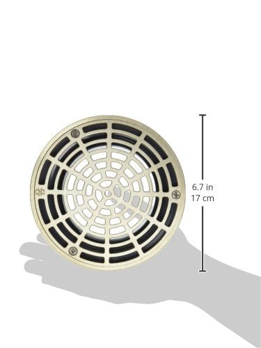 Circular metal coupling with radial ribbed pattern and black and cream-colored segments, 5.7 inches in diameter.