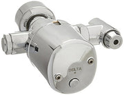 Chrome battery-operated flush valve with sensor activation and dual outlet ports, commercial grade.