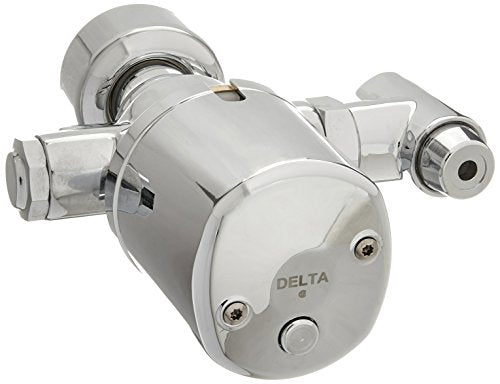 Chrome battery-operated flush valve with sensor activation and dual outlet ports, commercial grade.