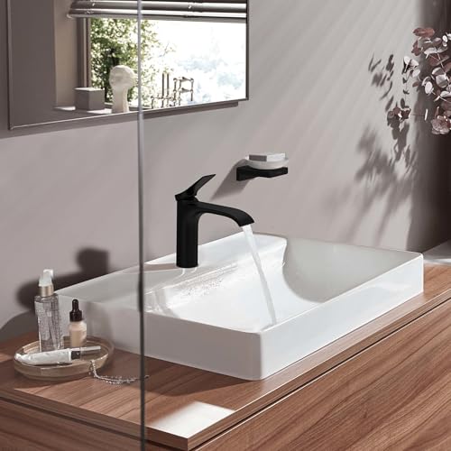 Matte black single-hole bathroom faucet with curved lever handle installed on white rectangular sink.