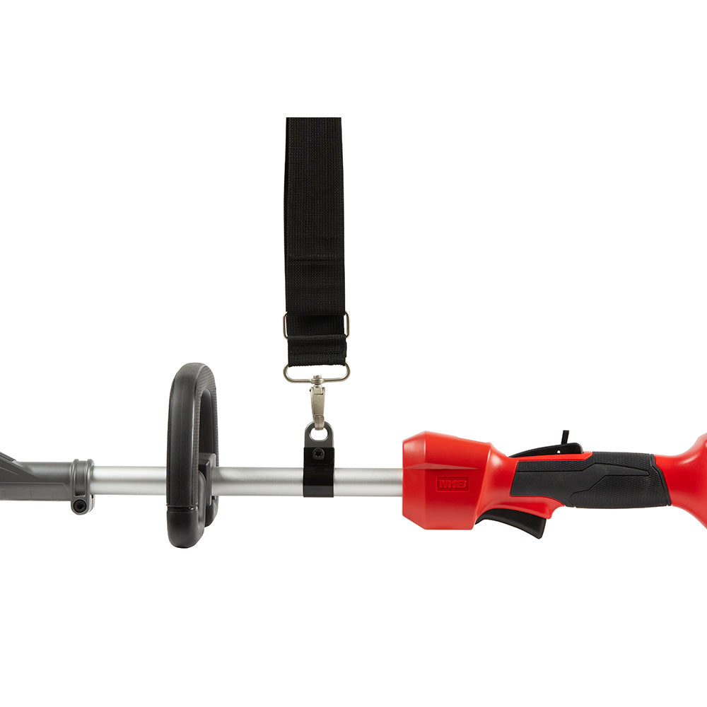 Black nylon shoulder strap with metal attachment hardware positioned between weight plate and red handle.