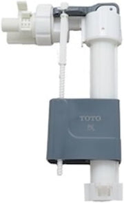 TOTO fill valve assembly with white plastic components, gray actuator arm, and dark gray water tank float mechanism.