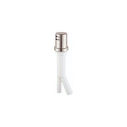 Stainless steel kitchen air gap with white plastic tubing and dual outlet ports.