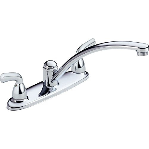 Chrome two-handle kitchen faucet with curved spout and lever handles on white base.