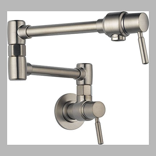 Stainless steel wall-mounted pot filler faucet with articulating arm and lever handle.