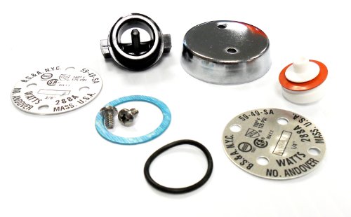 Vacuum breaker repair kit components including metal caps, diaphragms, gaskets, and internal seals arranged on white backgrou